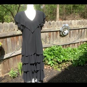 Stunning! Black, tiered, flutter sleeve dress.
